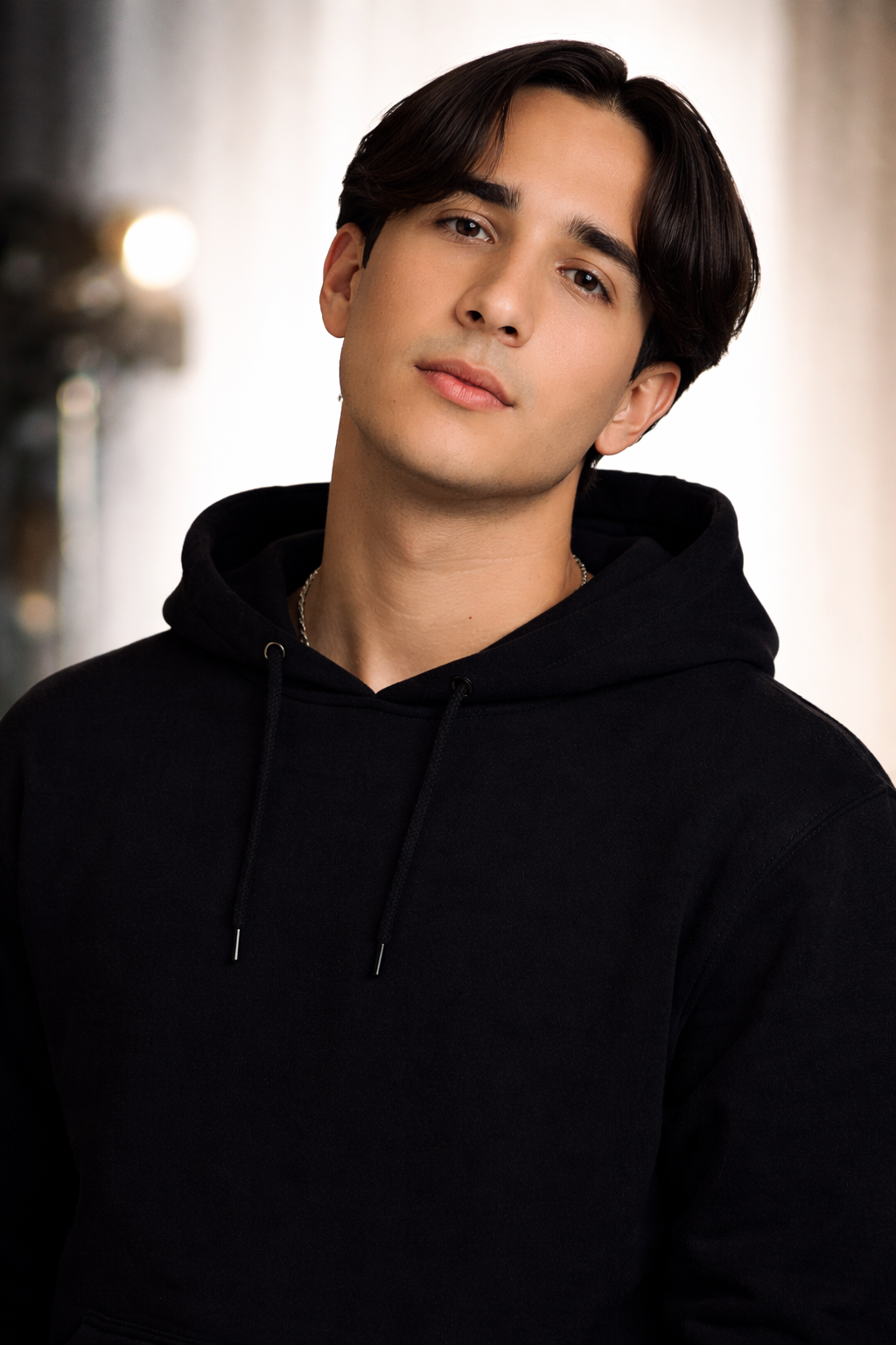 Ray from BeFour in a black hoodie